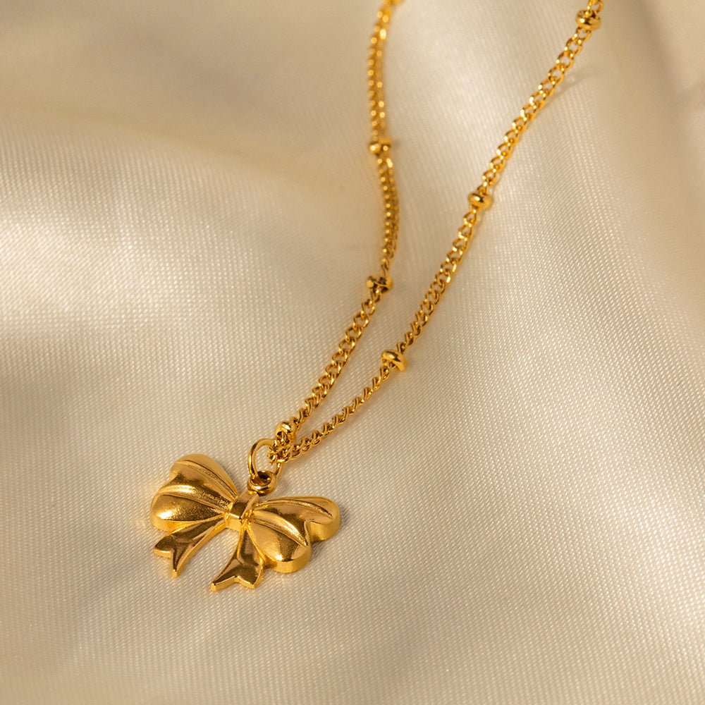 June Schleifenhalskette in Gold
