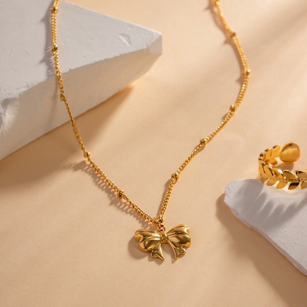June Schleifenhalskette in Gold