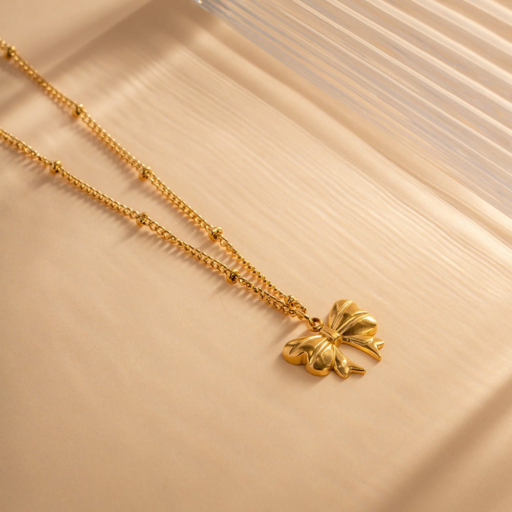 June Schleifenhalskette in Gold