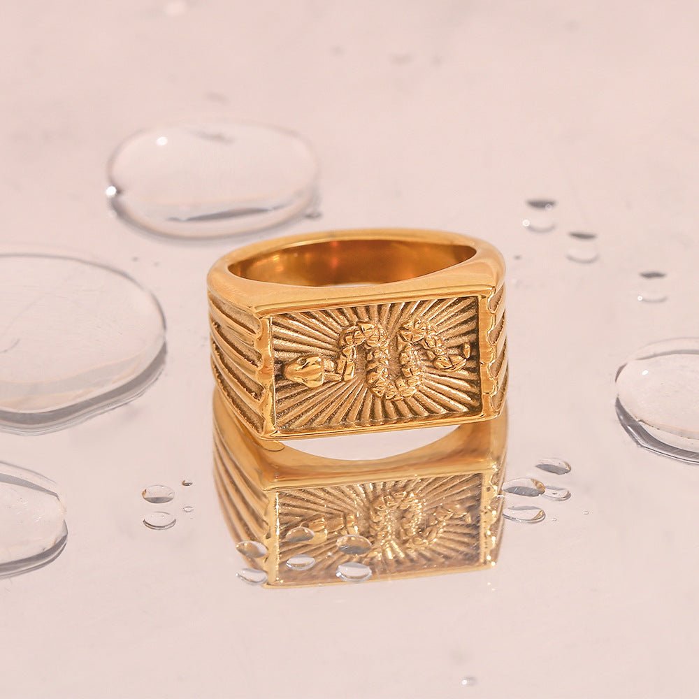 Miles Ring mit Schlangenmuster in Gold