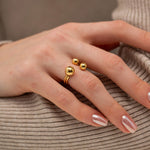 Plutos Umlaufbahn Ring in Gold